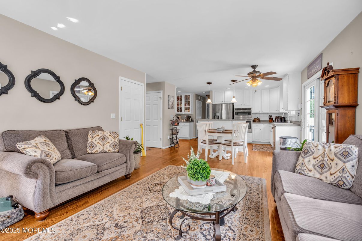 Dining room, Interior, Kitchen, Living room, Recessed Lighting, Stainless Steel Appliances, Wood Texture Flooring