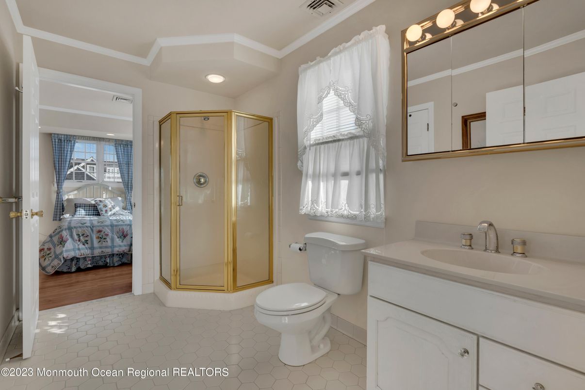 Bathroom, Bedroom, Glass Shower, Interior, Recessed Lighting, Wood Texture Flooring