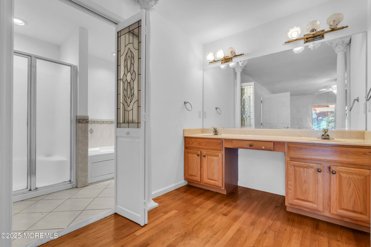 Bathroom, Dual Sink Vanities, Interior, Recessed Lighting, Wood Texture Flooring