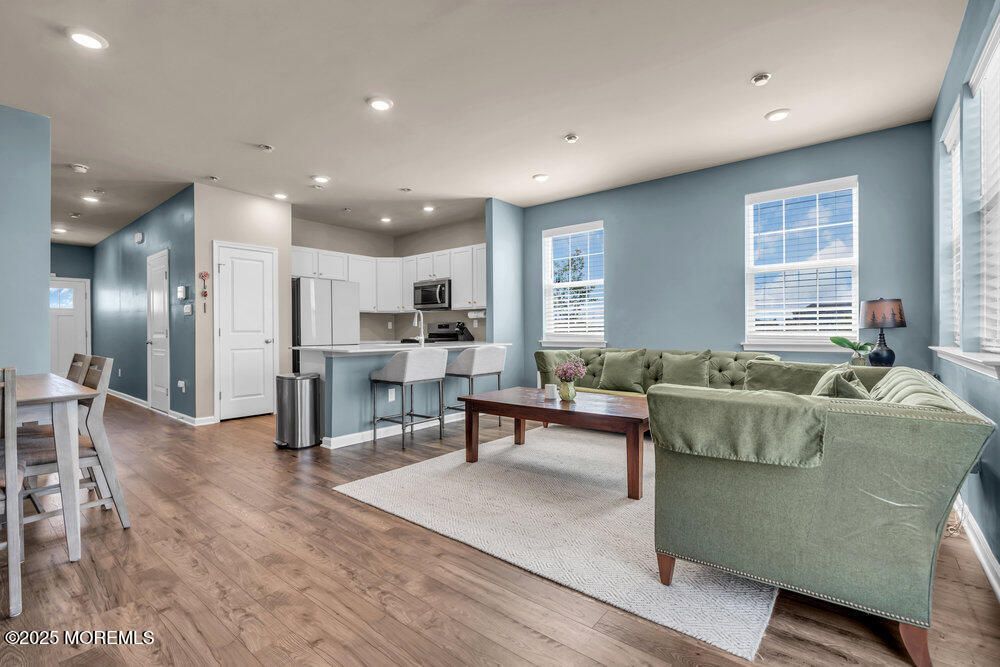 Dining room, Interior, Kitchen, Living room, Recessed Lighting, Stainless Steel Appliances, Wood Texture Flooring