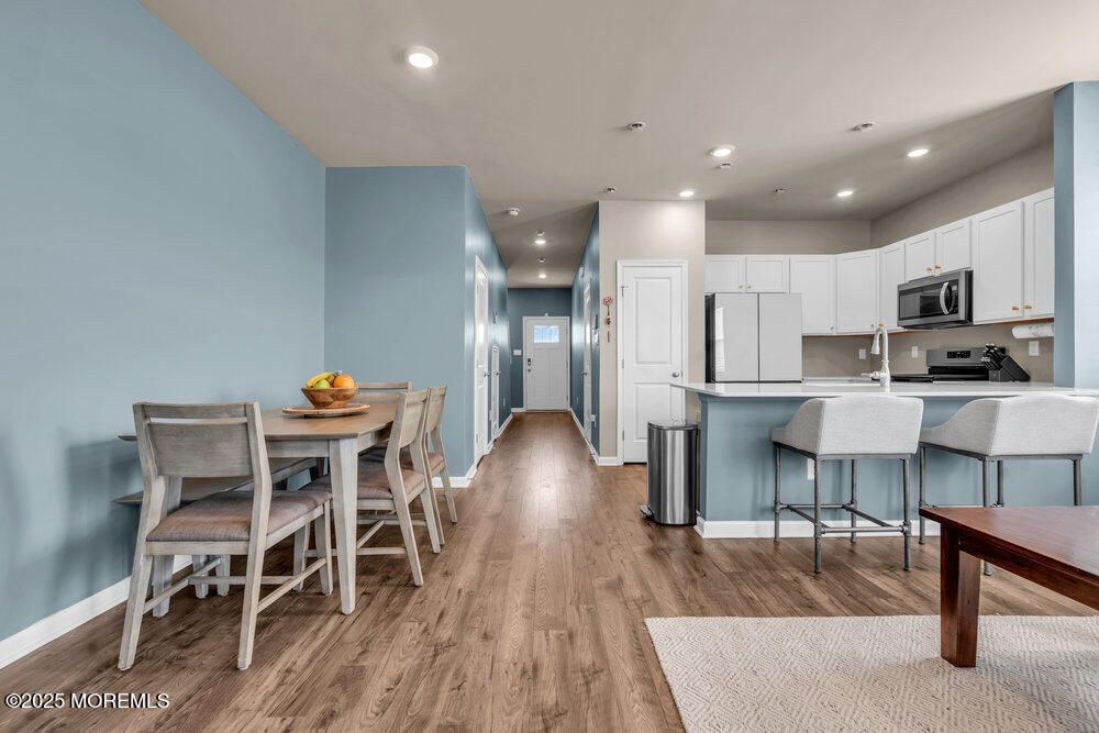 Dining room, Interior, Kitchen, Recessed Lighting, Stainless Steel Appliances, Wood Texture Flooring