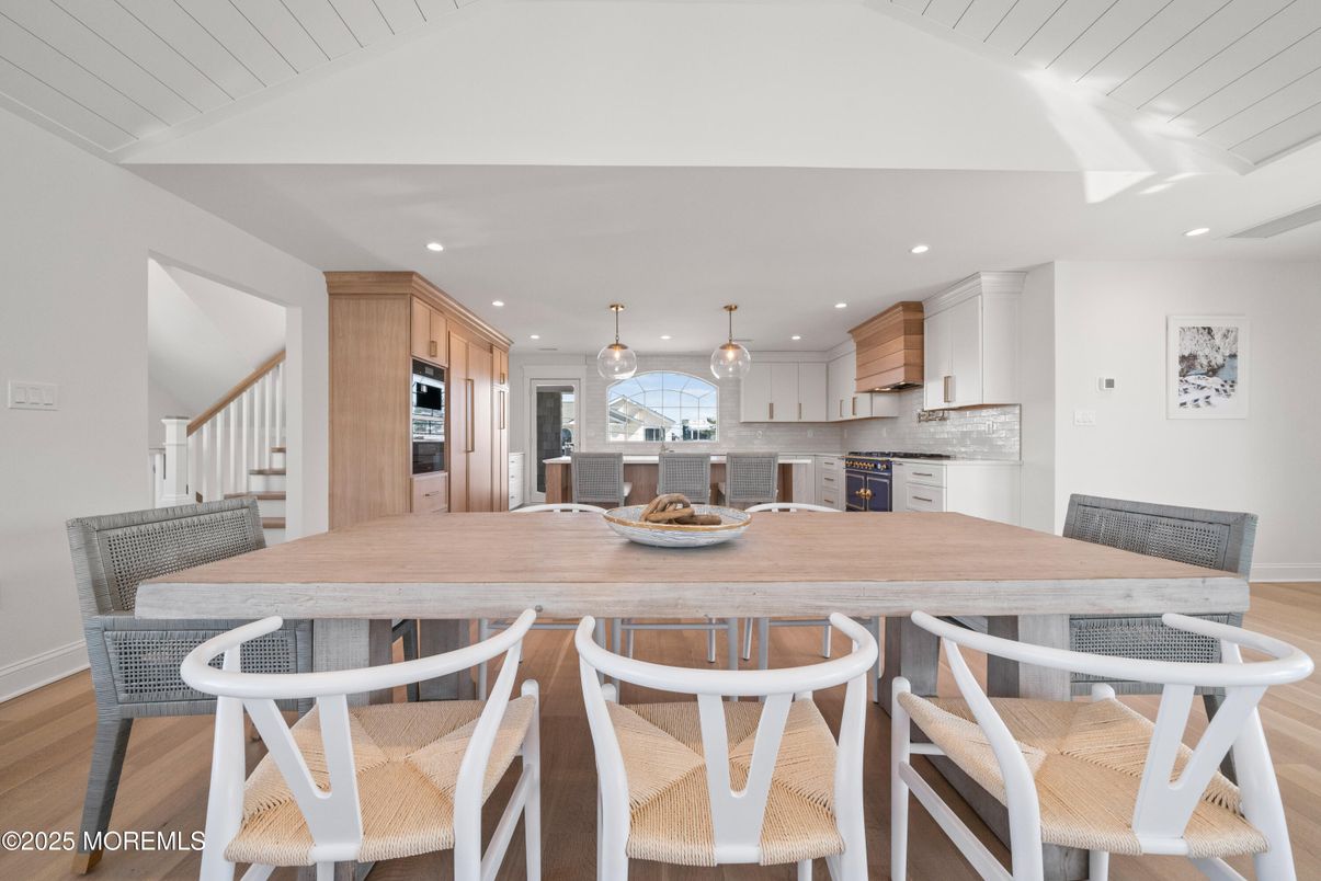Dining room, Interior, Kitchen, Pendant Lights, Recessed Lighting, Stainless Steel Appliances, Wood Texture Flooring