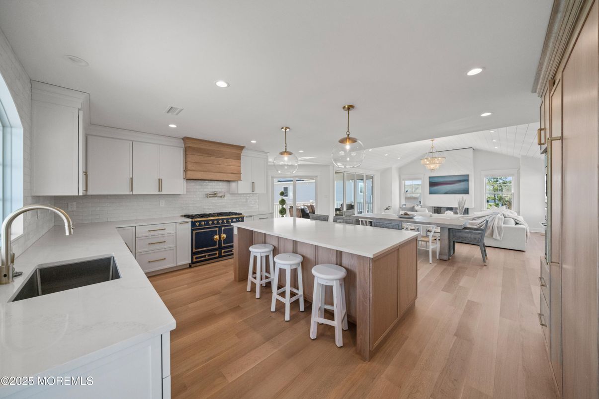 Dining room, Interior, Kitchen, Living room, Pendant Lights, Recessed Lighting, Stainless Steel Appliances, Wood Texture Flooring