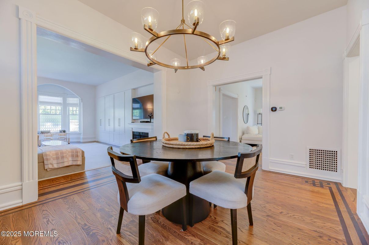 Chandelier, Dining room, Fireplace, Interior, Wood Texture Flooring