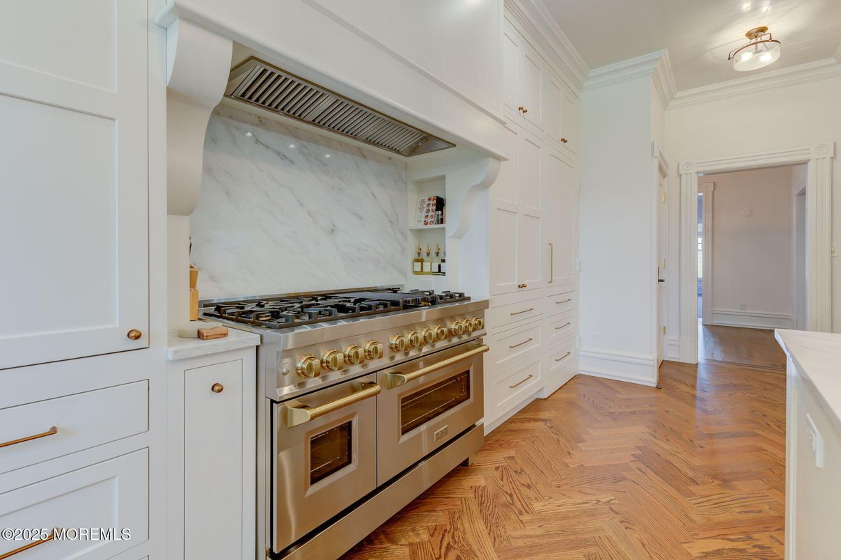 Interior, Kitchen, Marble Walls, Stainless Steel Appliances, Wood Texture Flooring