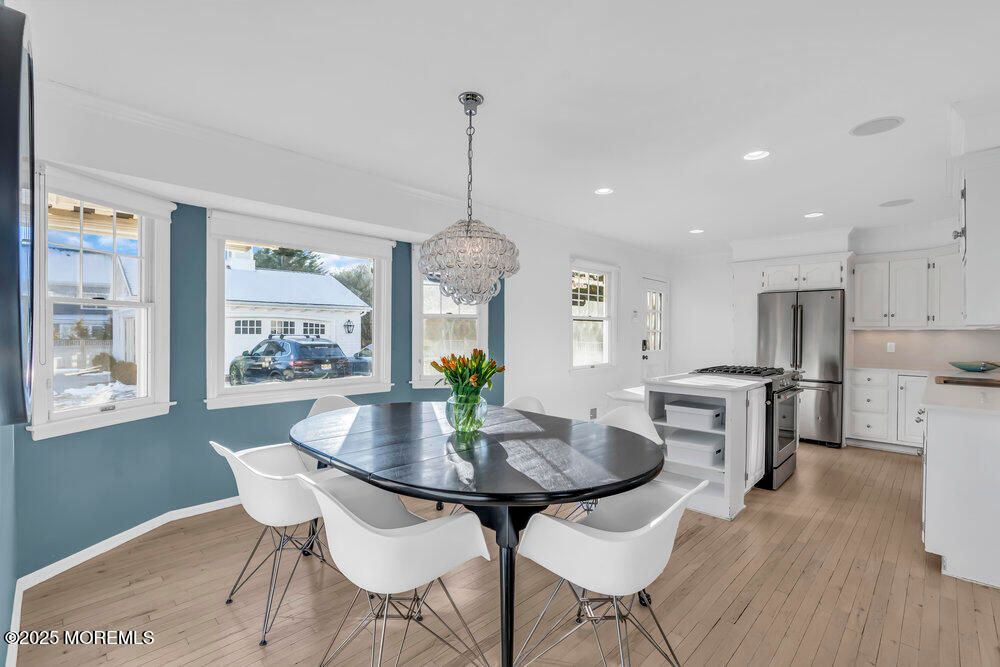 Dining room, Interior, Kitchen, Pendant Lights, Recessed Lighting, Stainless Steel Appliances, Wood Texture Flooring
