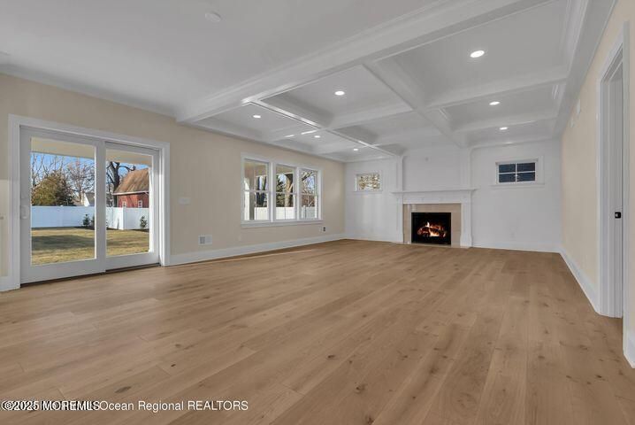Empty room, Fireplace, Interior, Recessed Lighting, Wood Texture Flooring