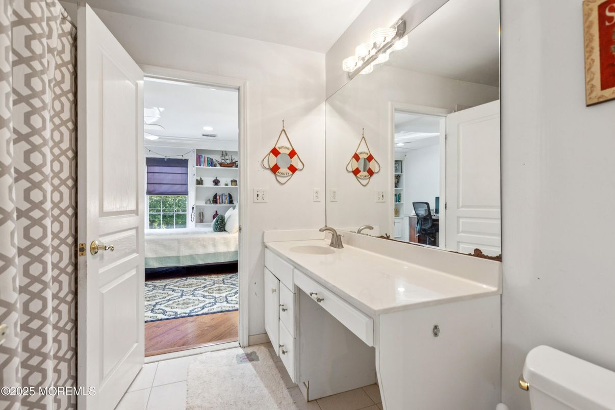 Bathroom, Dual Sink Vanities, Interior, Recessed Lighting, Wood Texture Flooring