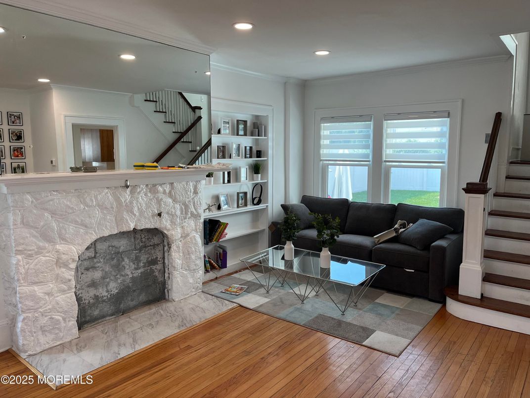 Fireplace, Interior, Living room, Recessed Lighting, Wood Texture Flooring