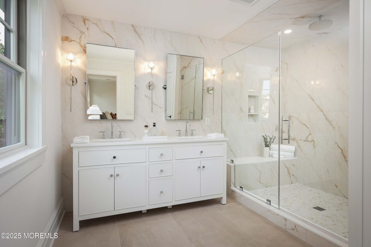 Bathroom, Dual Sink Vanities, Glass Shower, Interior, Marble Walls, Recessed Lighting