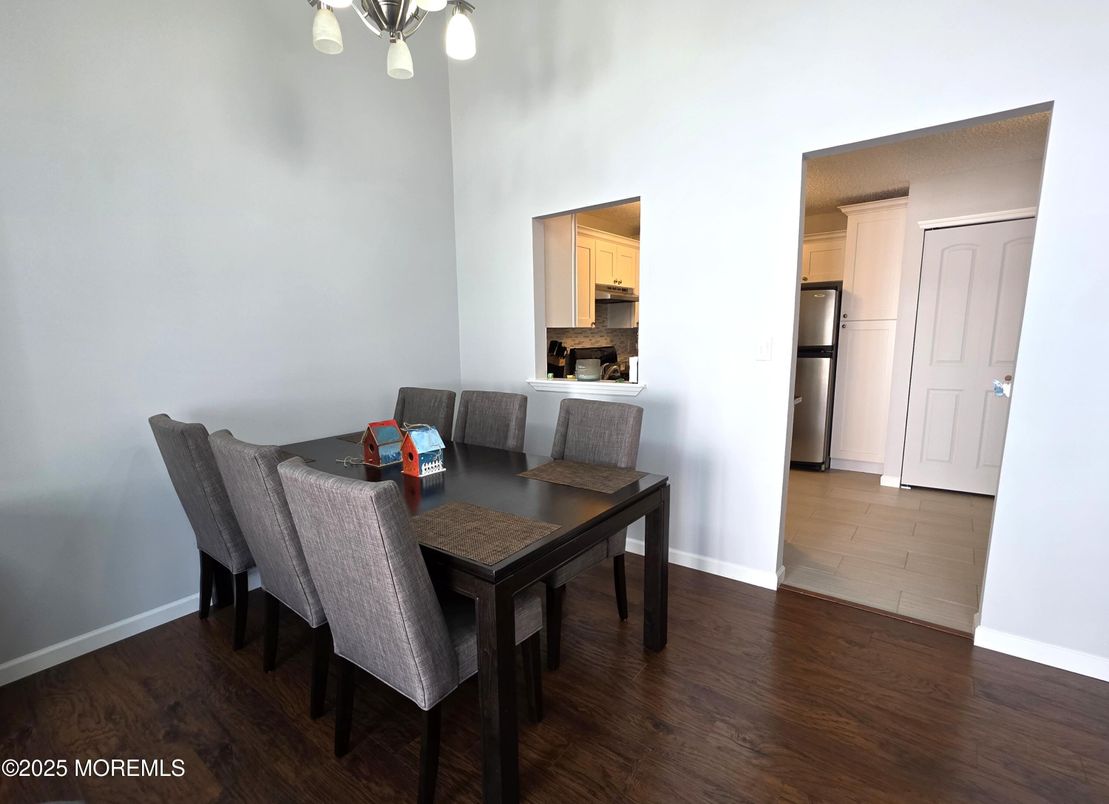 Dining room, Interior, Kitchen, Pendant Lights, Stainless Steel Appliances, Wood Texture Flooring