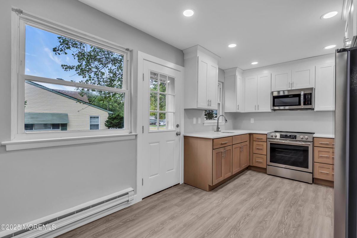 Interior, Kitchen, Recessed Lighting, Stainless Steel Appliances, Wood Texture Flooring