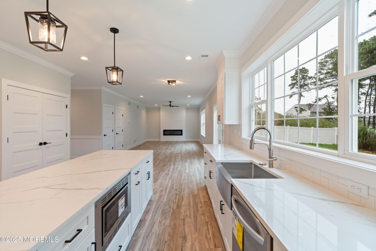 Interior, Kitchen, Pendant Lights, Recessed Lighting, Stainless Steel Appliances, Wood Texture Flooring