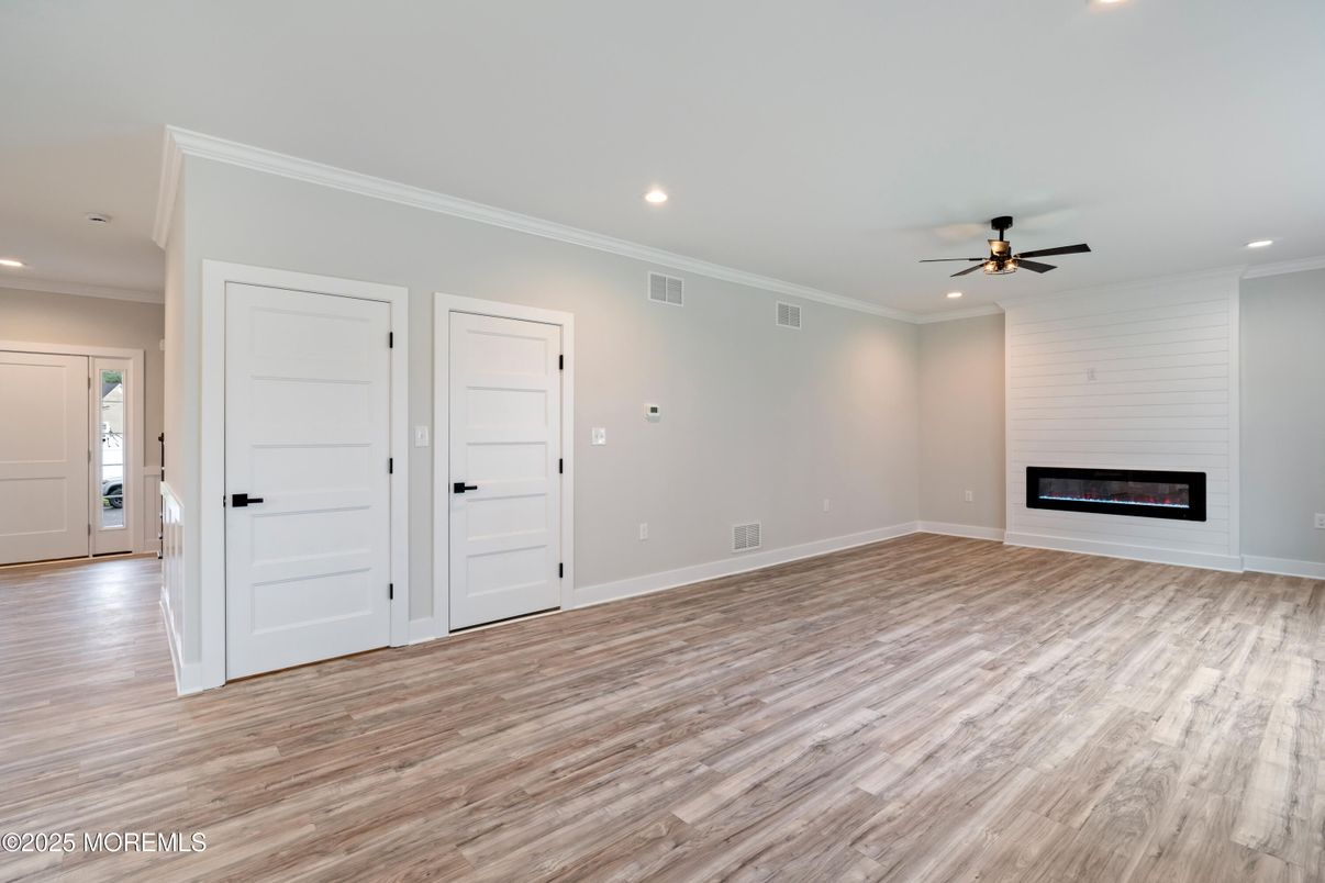 Empty room, Fireplace, Interior, Recessed Lighting, Wood Texture Flooring
