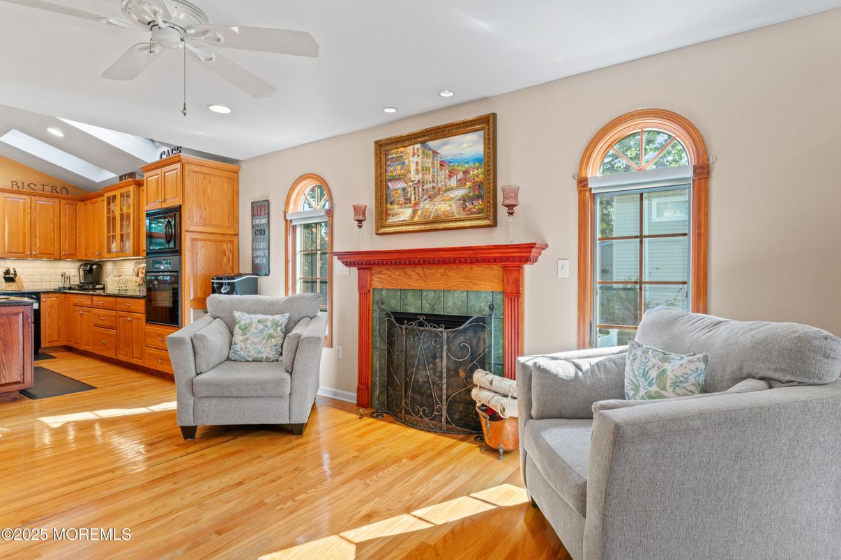 Fireplace, Interior, Kitchen, Living room, Recessed Lighting, Wood Texture Flooring