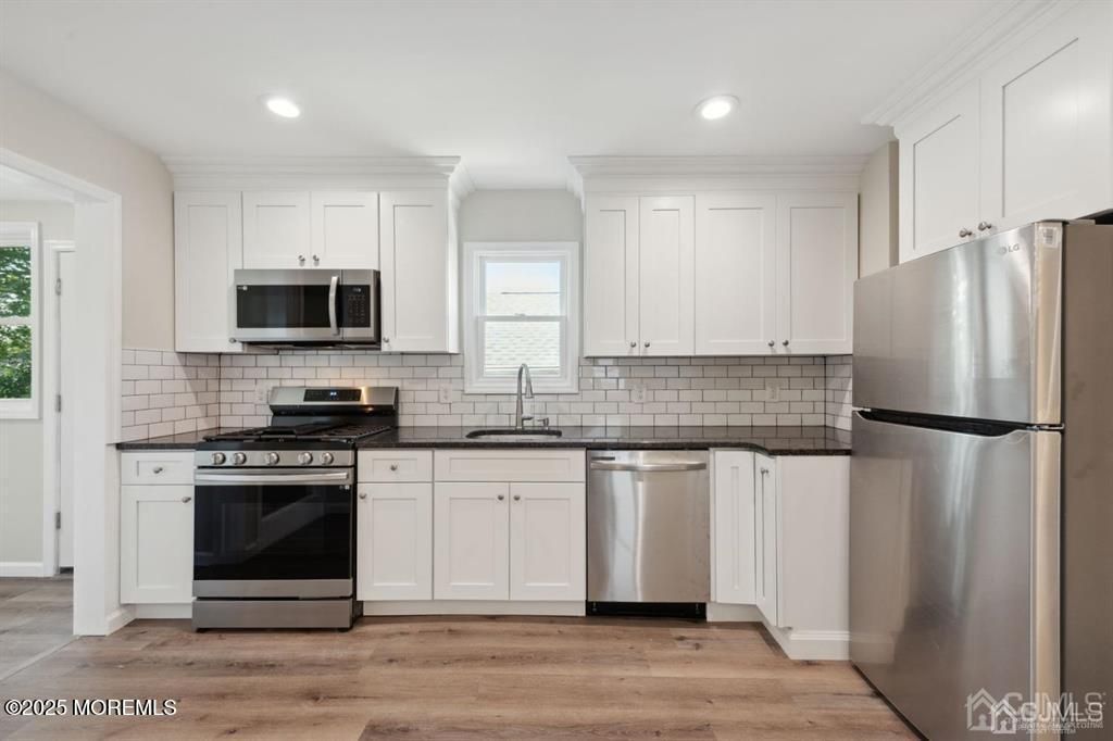 Interior, Kitchen, Recessed Lighting, Stainless Steel Appliances, Wood Texture Flooring