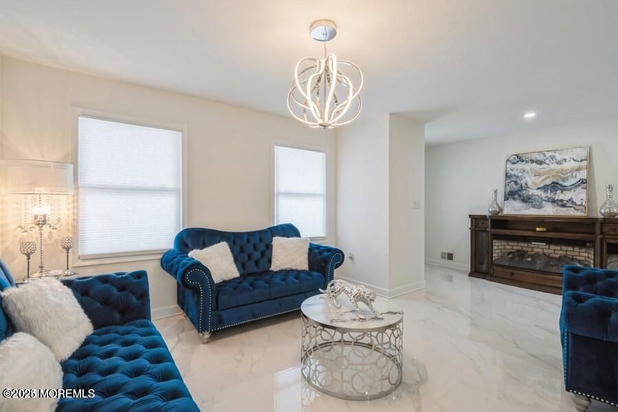 Fireplace, Interior, Living room, Marble, Pendant Lights, Recessed Lighting