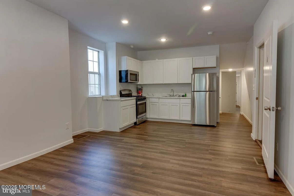 Interior, Kitchen, Recessed Lighting, Stainless Steel Appliances, Wood Texture Flooring