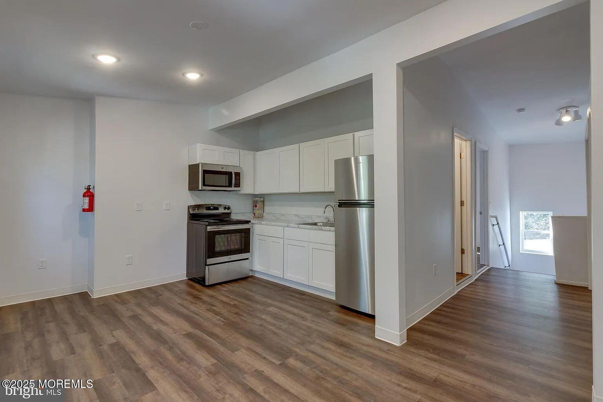 Interior, Kitchen, Recessed Lighting, Stainless Steel Appliances, Wood Texture Flooring