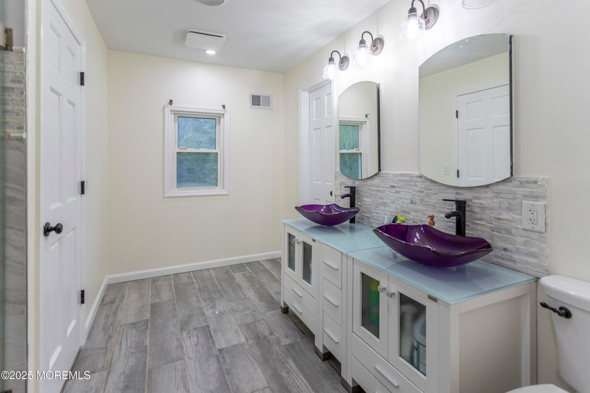 Bathroom, Dual Sink Vanities, Interior, Recessed Lighting, Wood Texture Flooring