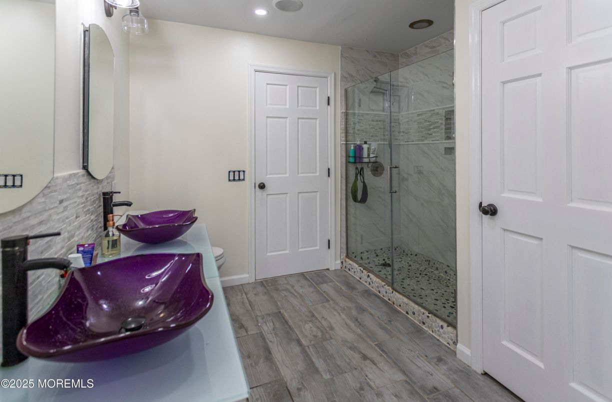 Bathroom, Glass Shower, Interior, Marble Walls, Recessed Lighting, Wood Texture Flooring