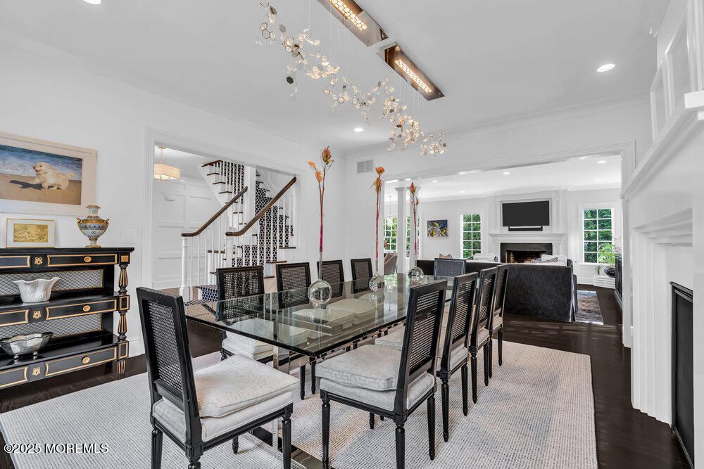 Dining room, Fireplace, Interior, Living room, Recessed Lighting, Wood Texture Flooring