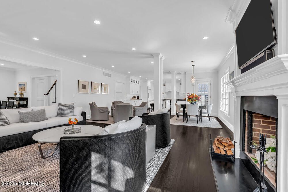 Dining room, Fireplace, Interior, Living room, Pendant Lights, Recessed Lighting, Wood Texture Flooring