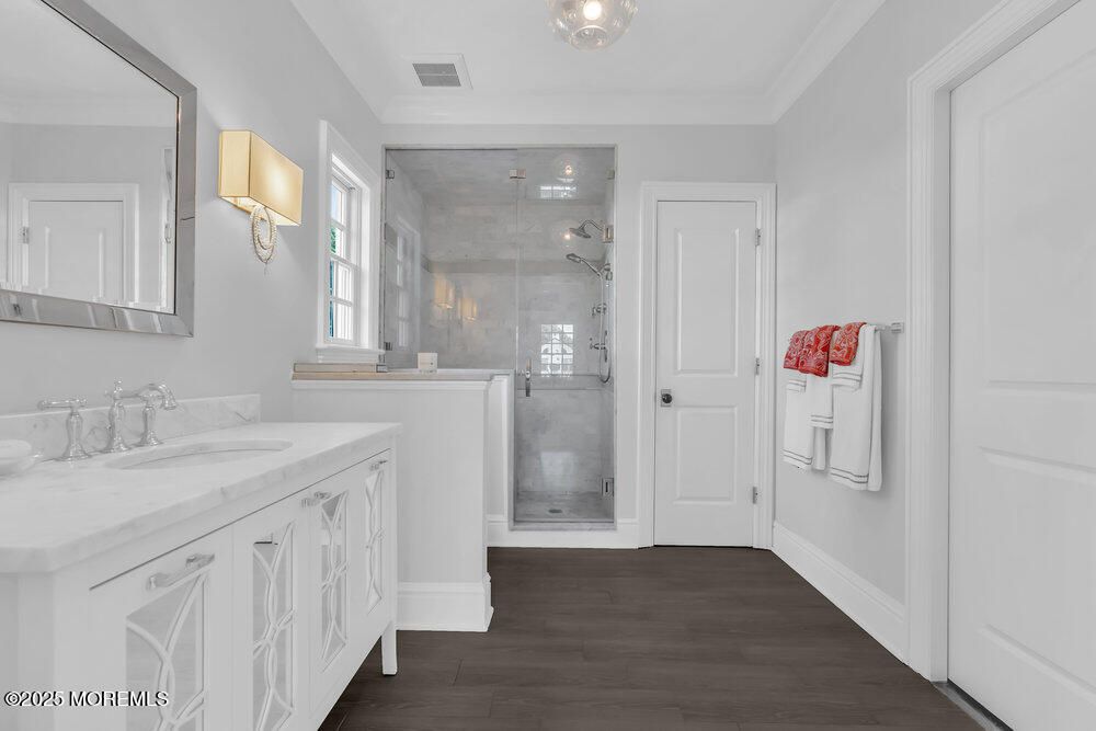 Bathroom, Dual Sink Vanities, Glass Shower, Interior, Wood Texture Flooring