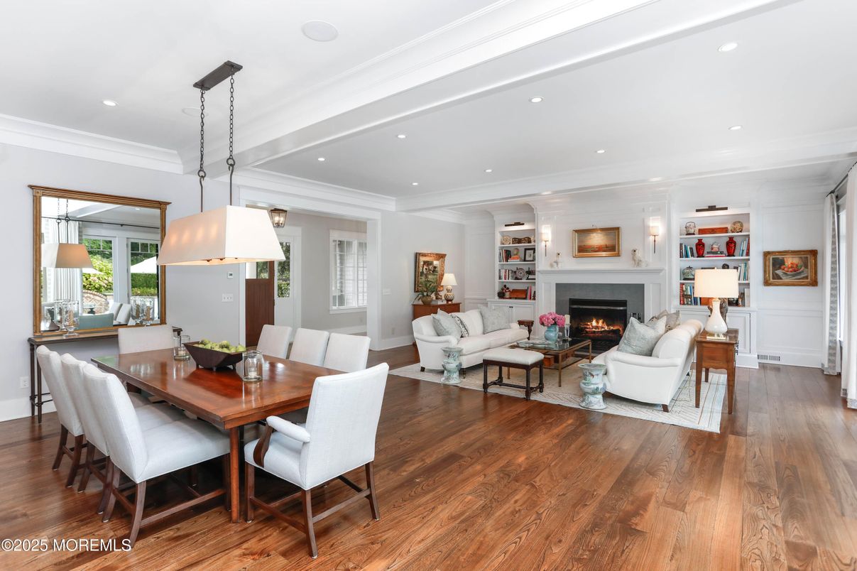 Dining room, Fireplace, Interior, Living room, Pendant Lights, Recessed Lighting, Wood Texture Flooring
