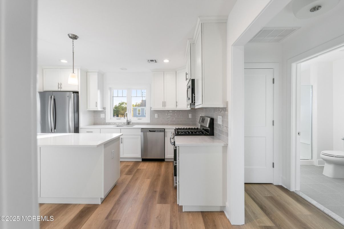 Interior, Kitchen, Pendant Lights, Recessed Lighting, Stainless Steel Appliances, Wood Texture Flooring