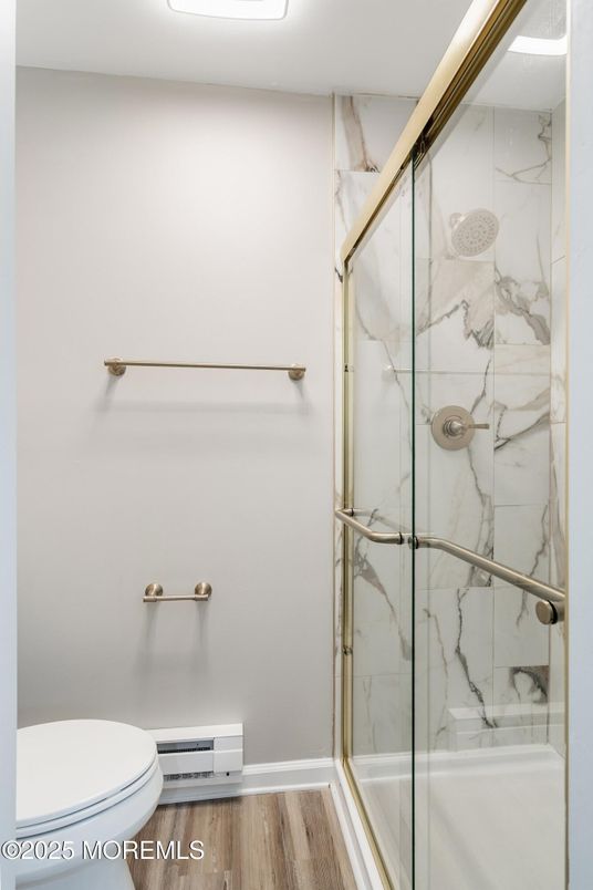 Bathroom, Glass Shower, Interior, Marble Walls, Wood Texture Flooring