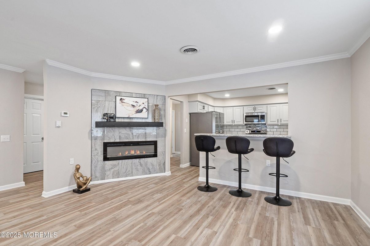 Fireplace, Interior, Kitchen, Recessed Lighting, Wood Texture Flooring