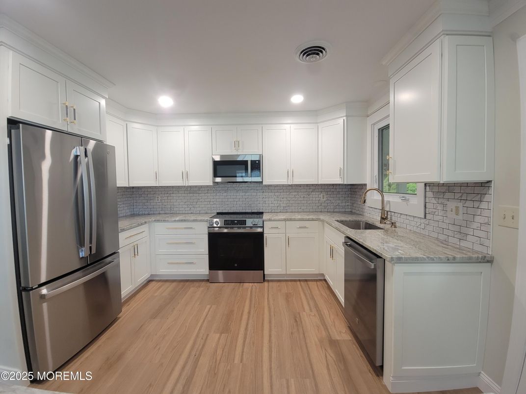 Interior, Kitchen, Recessed Lighting, Stainless Steel Appliances, Wood Texture Flooring