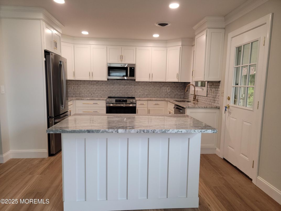 Interior, Kitchen, Recessed Lighting, Stainless Steel Appliances, Wood Texture Flooring