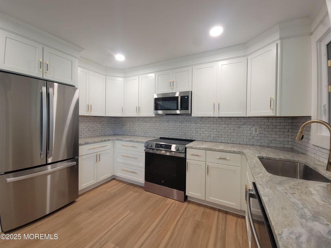 Interior, Kitchen, Recessed Lighting, Stainless Steel Appliances, Wood Texture Flooring