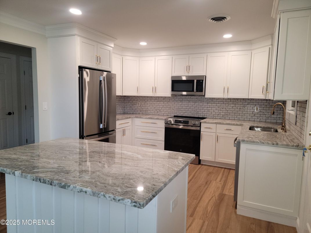 Interior, Kitchen, Recessed Lighting, Stainless Steel Appliances, Wood Texture Flooring