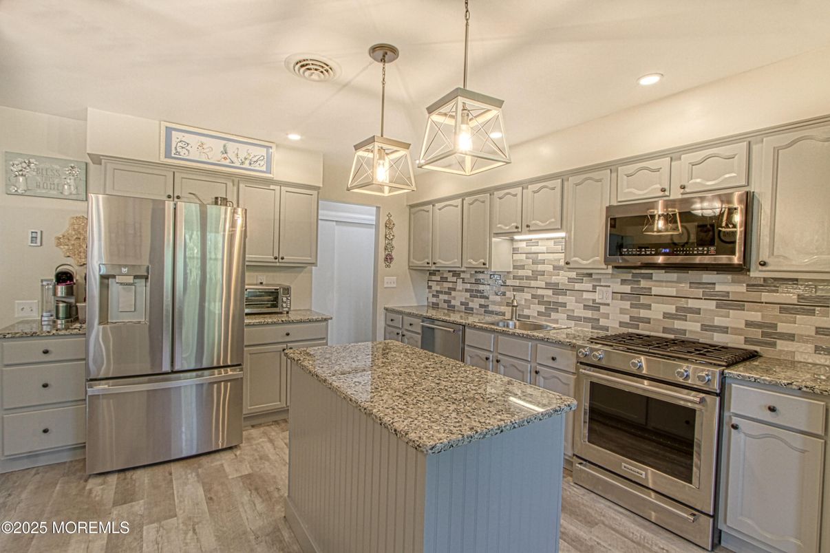 Interior, Kitchen, Pendant Lights, Recessed Lighting, Stainless Steel Appliances, Wood Texture Flooring
