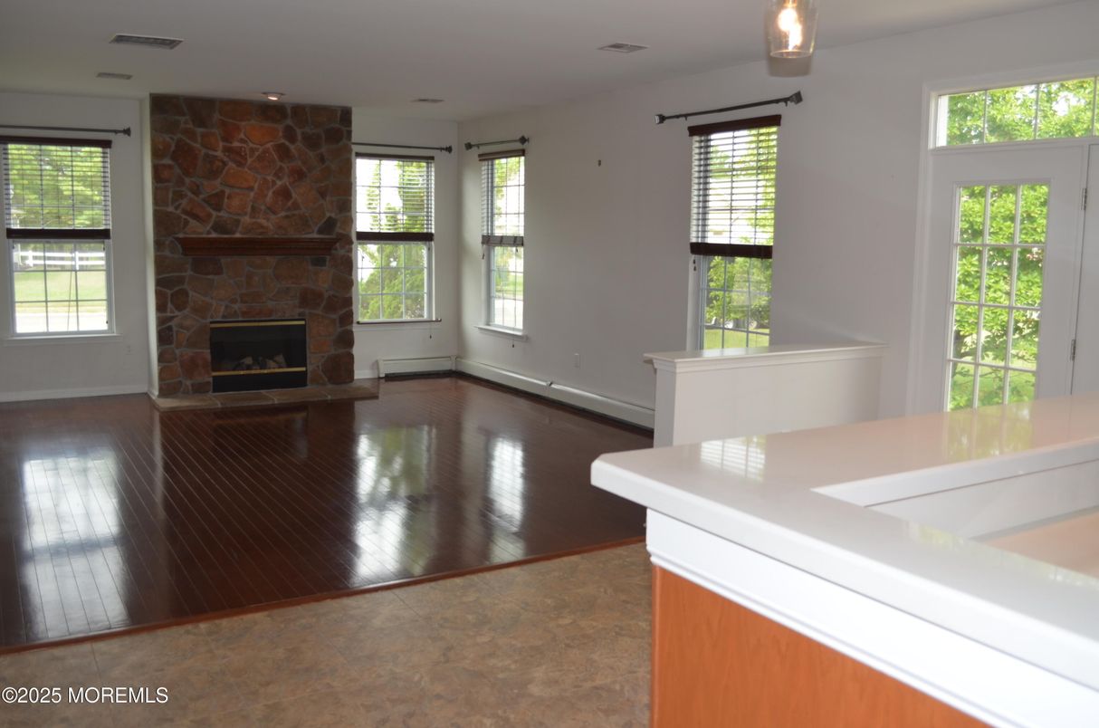 Fireplace, Interior, Recessed Lighting, Stone Walls, Wood Texture Flooring