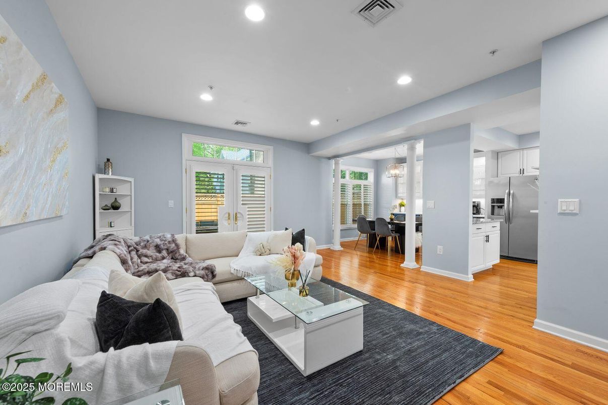 Dining room, Interior, Kitchen, Living room, Recessed Lighting, Stainless Steel Appliances, Wood Texture Flooring