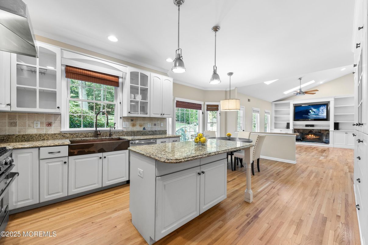 Dining room, Fireplace, Interior, Kitchen, Pendant Lights, Recessed Lighting, Wood Texture Flooring