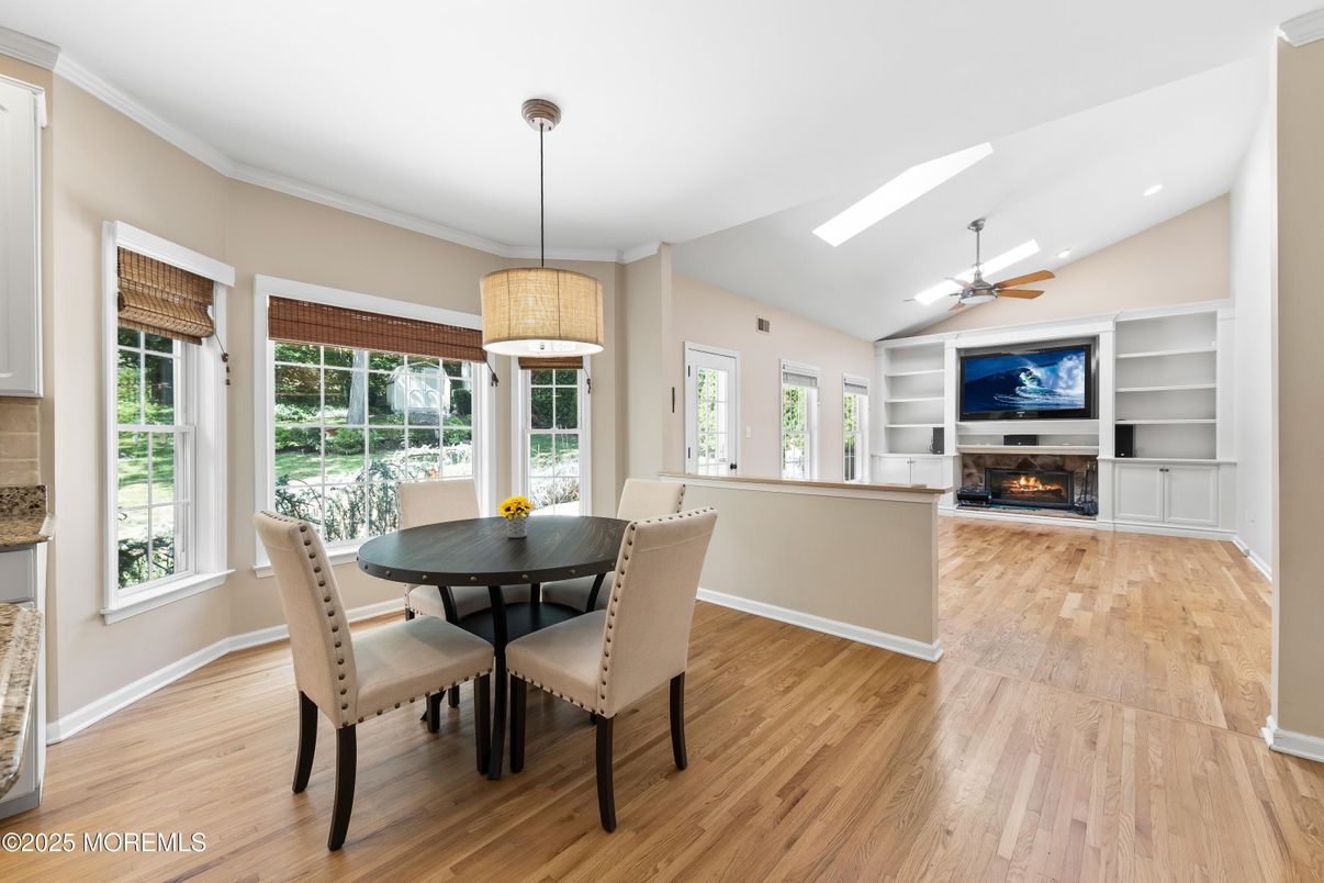 Dining room, Fireplace, Interior, Pendant Lights, Recessed Lighting, Wood Texture Flooring