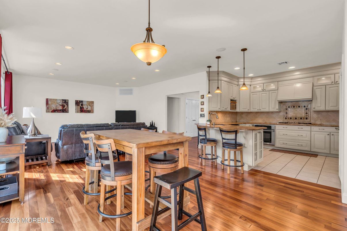 Dining room, Interior, Kitchen, Living room, Pendant Lights, Recessed Lighting, Wood Texture Flooring