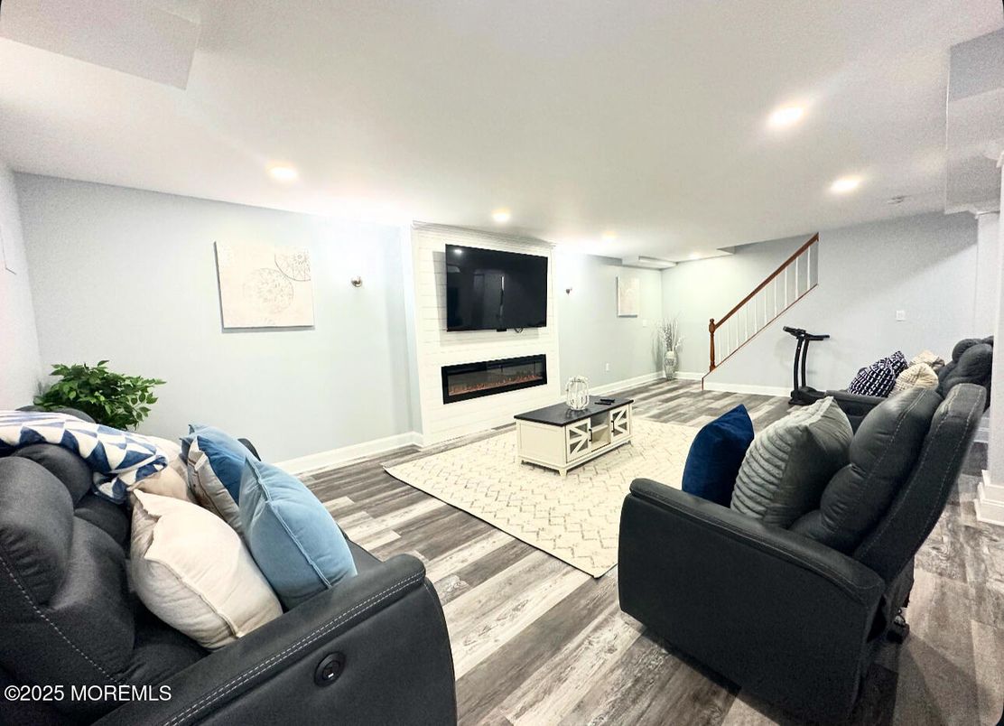 Fireplace, Interior, Living room, Recessed Lighting, Wood Texture Flooring