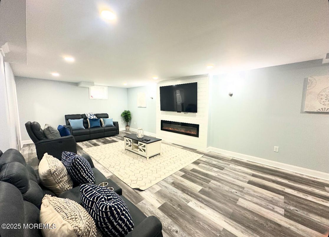 Fireplace, Interior, Living room, Recessed Lighting, Wood Texture Flooring