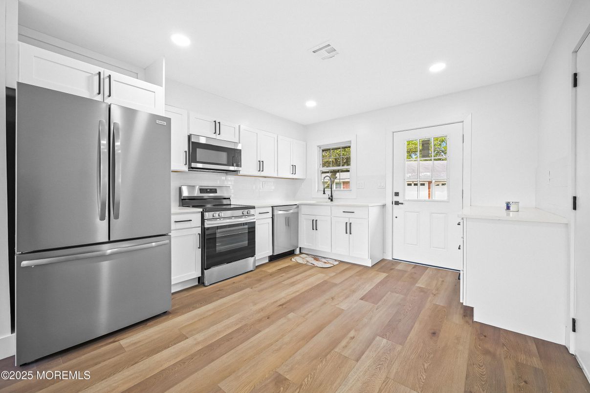 Interior, Kitchen, Recessed Lighting, Stainless Steel Appliances, Wood Texture Flooring