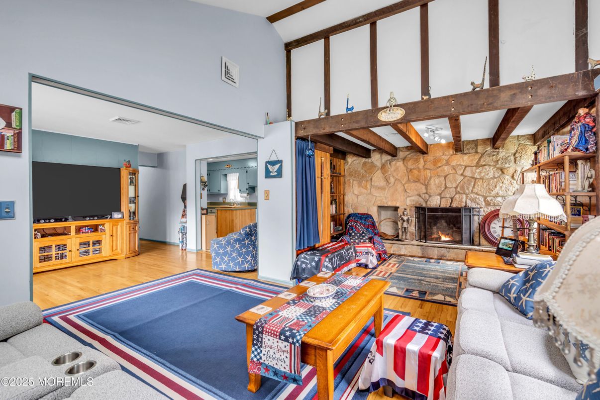 Fireplace, Interior, Living room, Stone Walls, Wooden Beams, Wood Texture Flooring