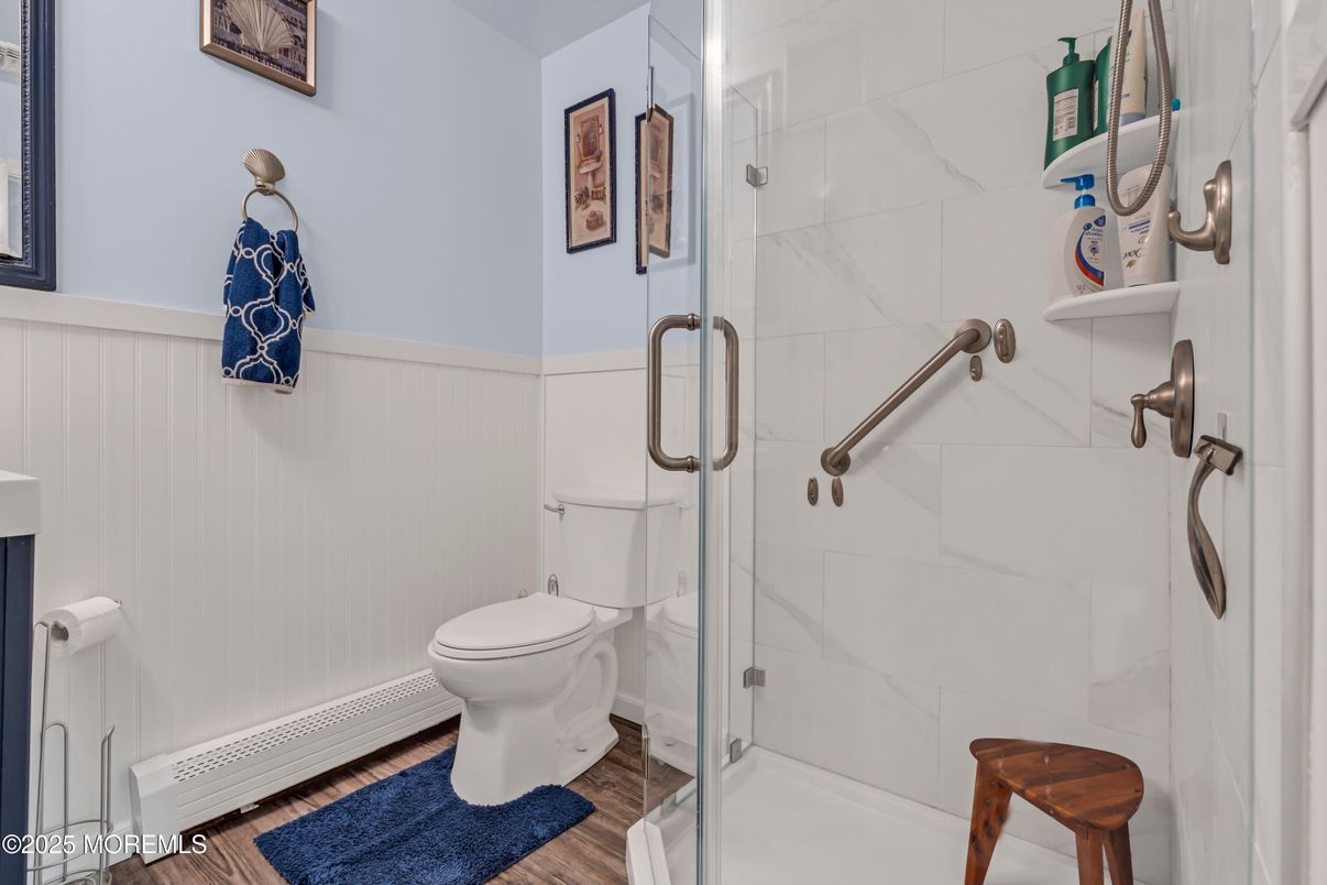 Bathroom, Glass Shower, Interior, Marble Walls, Wood Texture Flooring