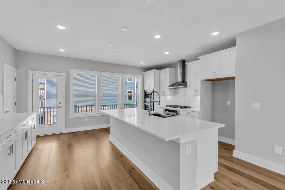Interior, Kitchen, Recessed Lighting, Stainless Steel Appliances, Water, Wood Texture Flooring