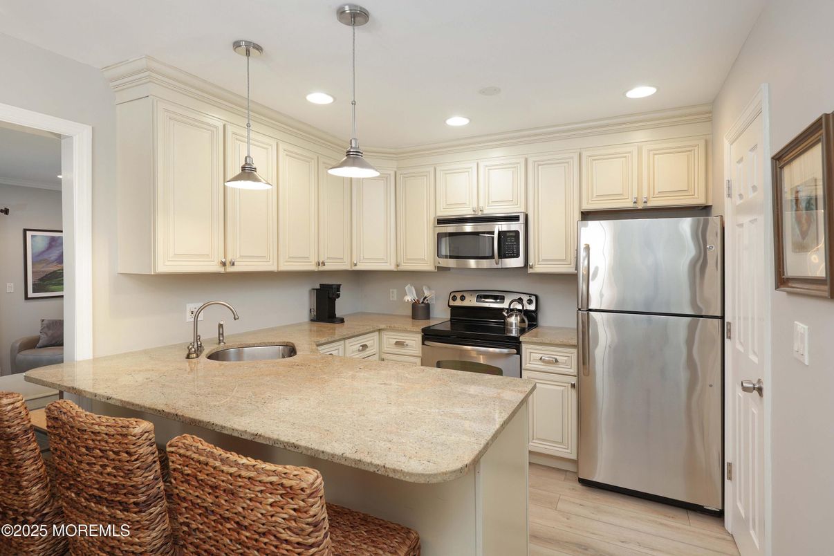 Interior, Kitchen, Pendant Lights, Recessed Lighting, Stainless Steel Appliances, Wood Texture Flooring