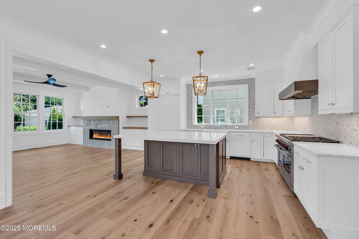 Fireplace, Interior, Kitchen, Pendant Lights, Recessed Lighting, Stainless Steel Appliances, Wood Texture Flooring